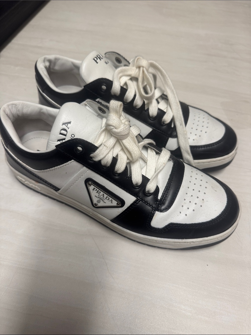 Prada Black and White Leather Low-Top Sneakers